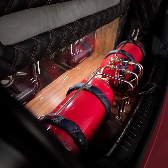 Custom red air-ride tank install