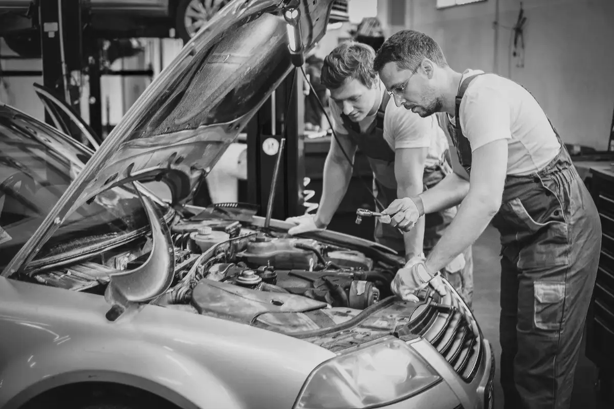 The J6 team working on an engine bay